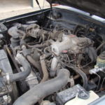 A car engine with many parts in it