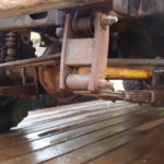 A close up of the front end of an old truck