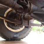 A close up of the front tire on an off road vehicle.