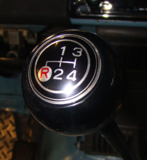 A close up of the shift knob on a car