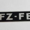 A sticker that says fz-fe in white letters.